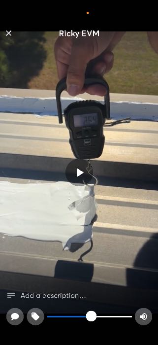 Installed silicone roof system with a pull test in Madison, MS, photo 5