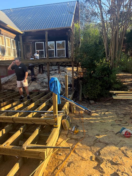 Demo old deck and building back in Raymond, MS