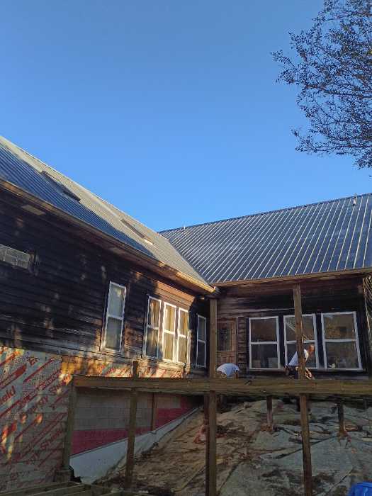 Replacing all the screws in a metal roof in Raymond, MS, photo 2