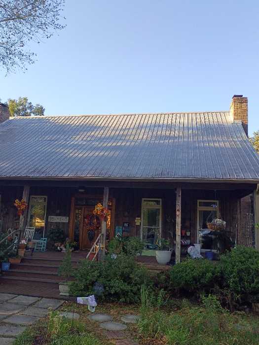 Replacing all the screws in a metal roof in Raymond, MS, photo 4