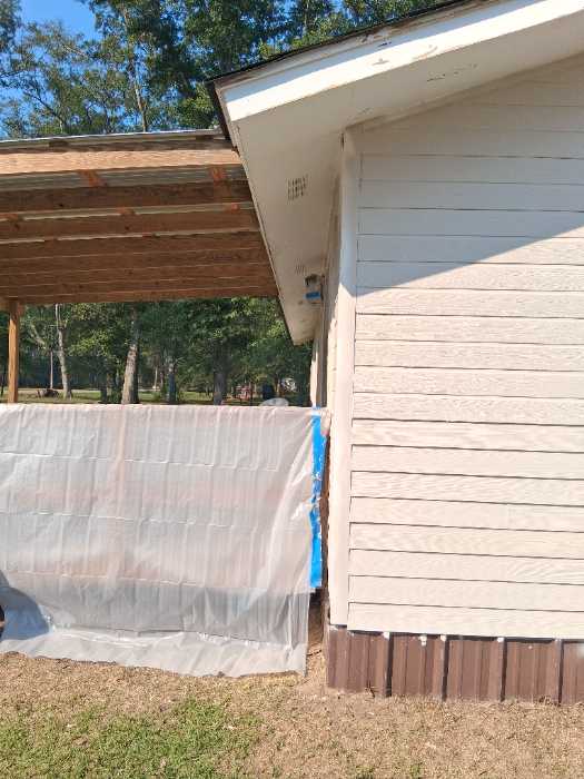 Prepping for paint and first coat with spray rigs in Brandon, MS