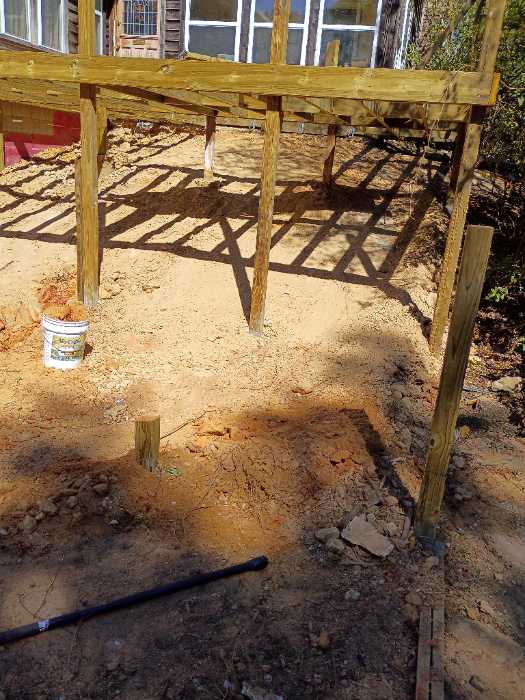 Building up dirt digging trenches so we can connect plumbing in Raymond, MS