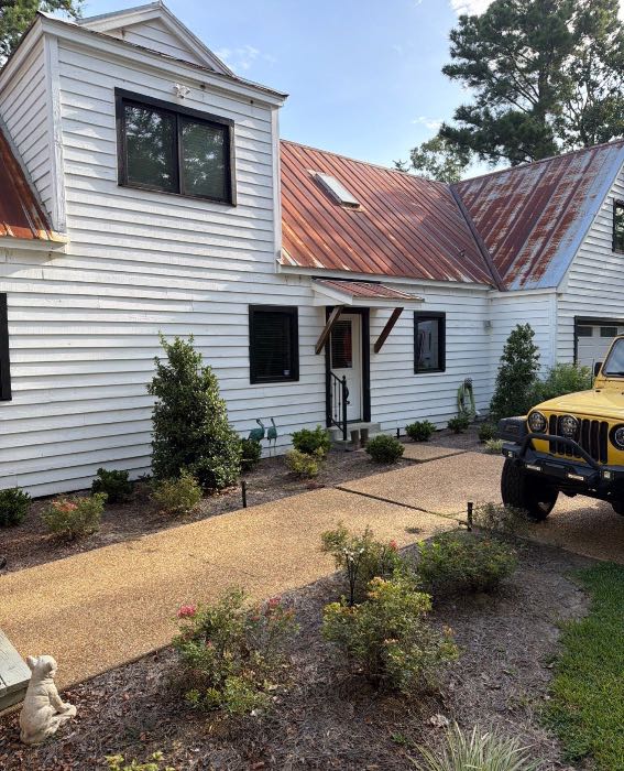 Metal Roof and skylight replacement, chimney removed and covered in Brandon, MS