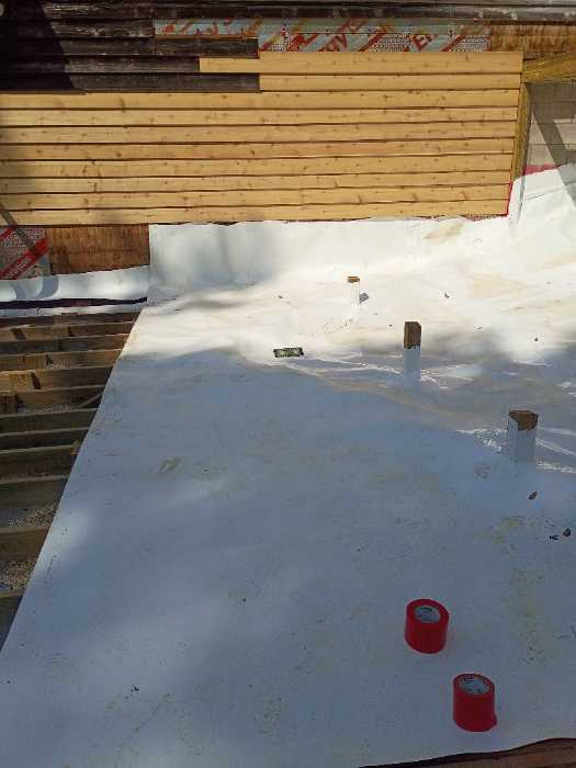 Laying out TPO and selling it with silicone on the seams in Raymond, MS, photo 3