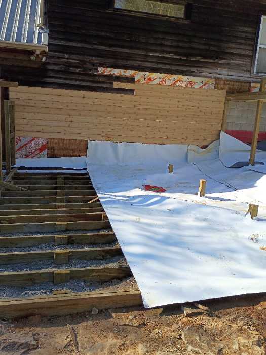 Laying out TPO and selling it with silicone on the seams in Raymond, MS, photo 5