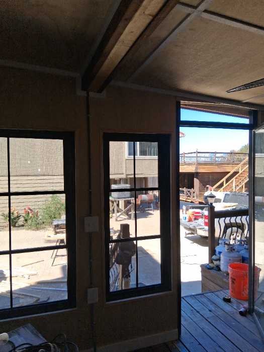 Casing out windows and doors priming for paint in Canton, MS