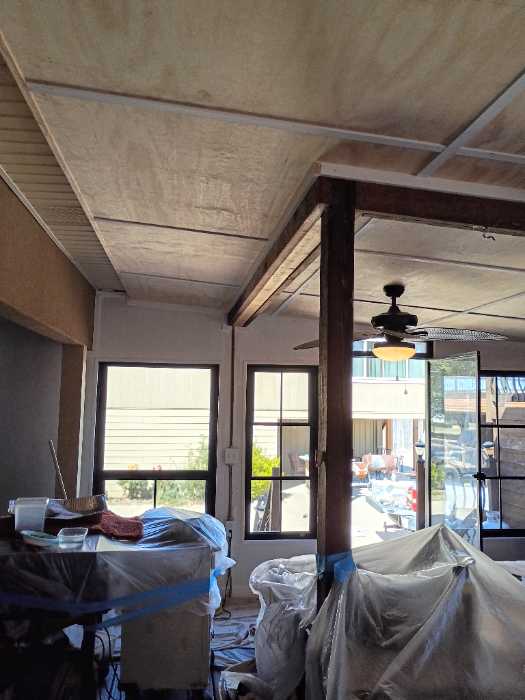 Priming the raw wood in Canton, MS