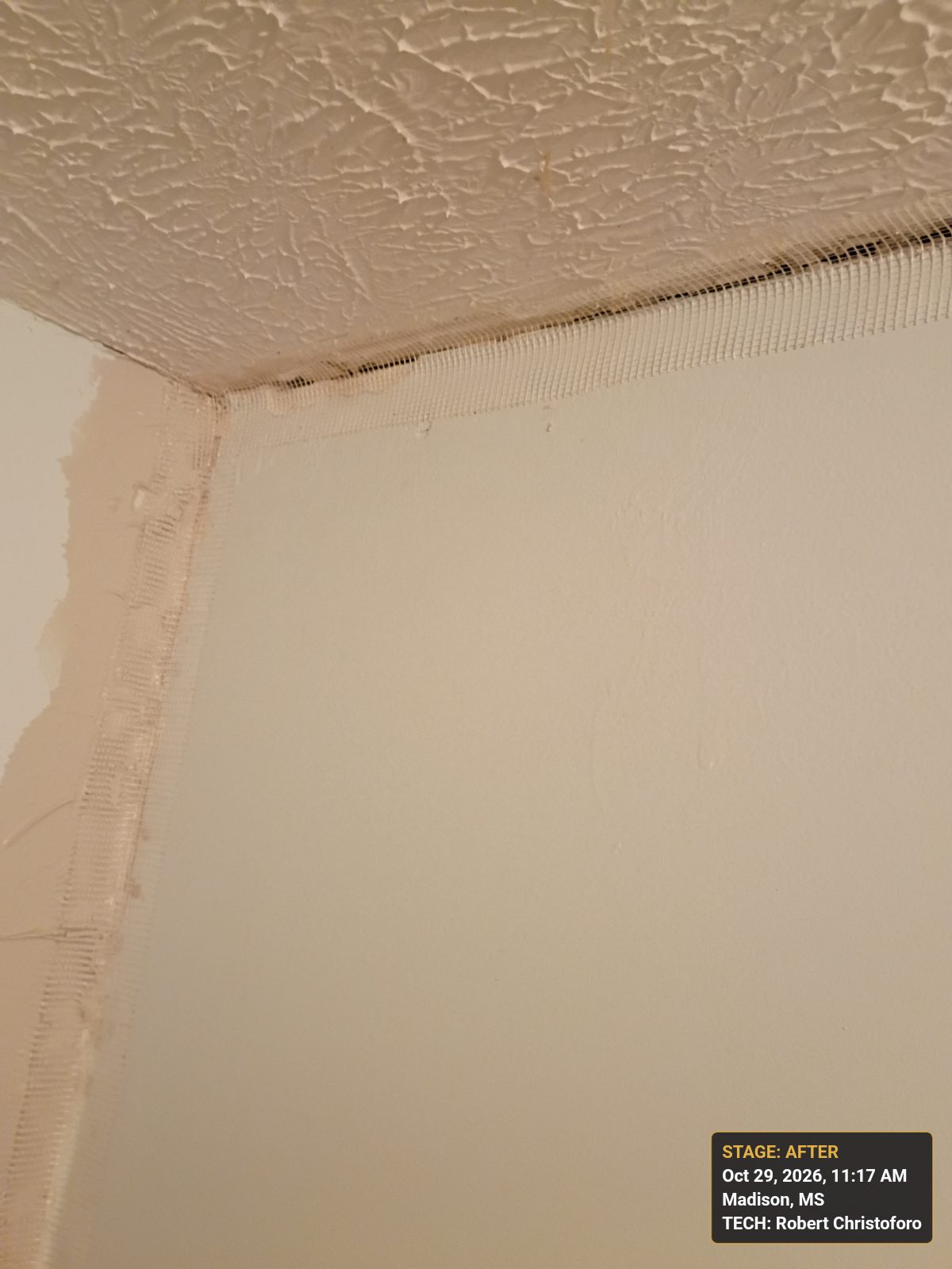 Mudding the seams in the ceiling and on the wall in Madison, MS