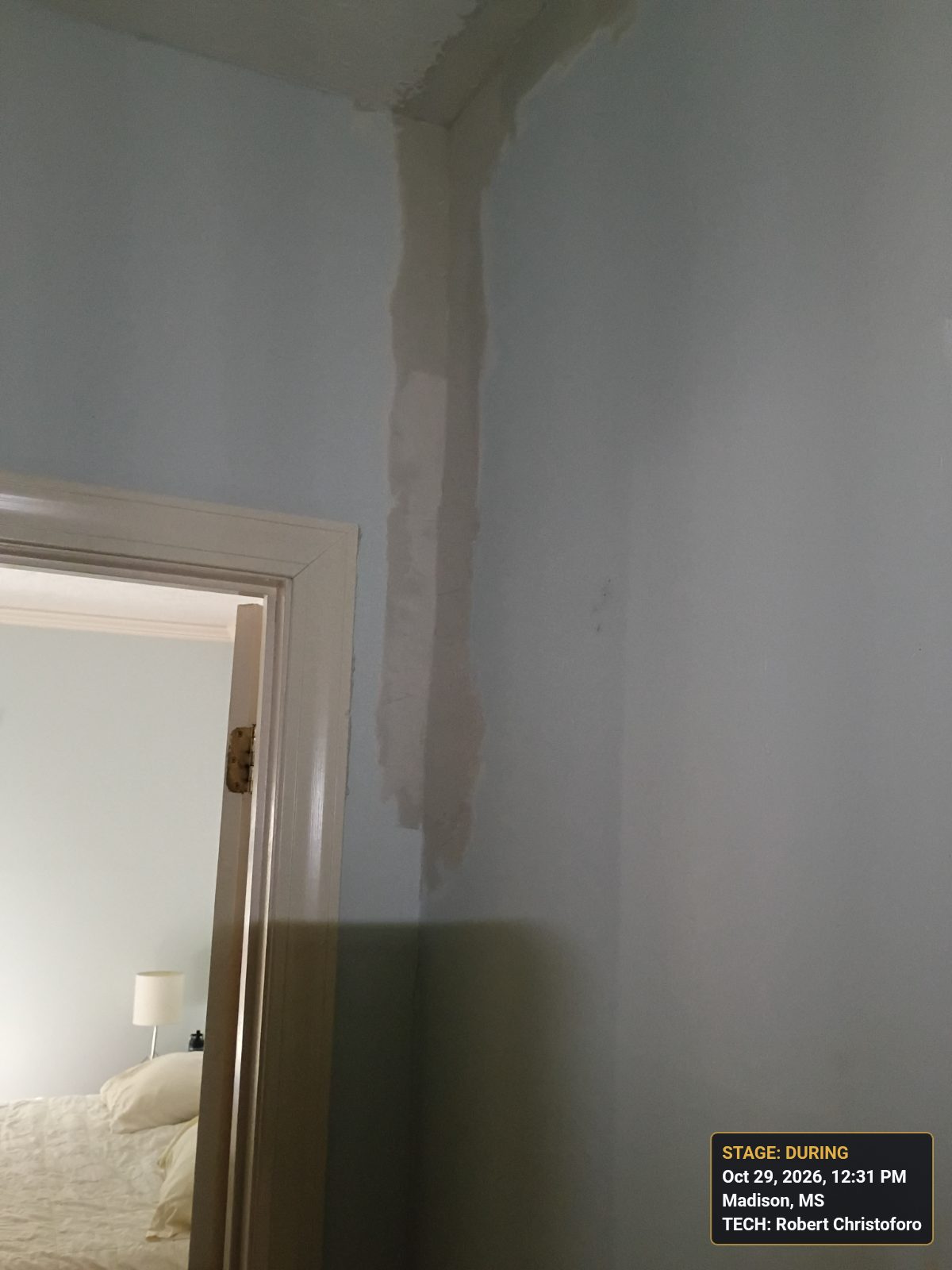 Mudding the seams in the ceiling and on the wall in Madison, MS, photo 4