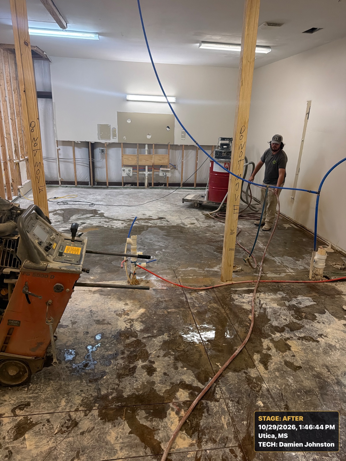 Saw cut concrete slab to bust out concrete to move plumbing in Utica, MS