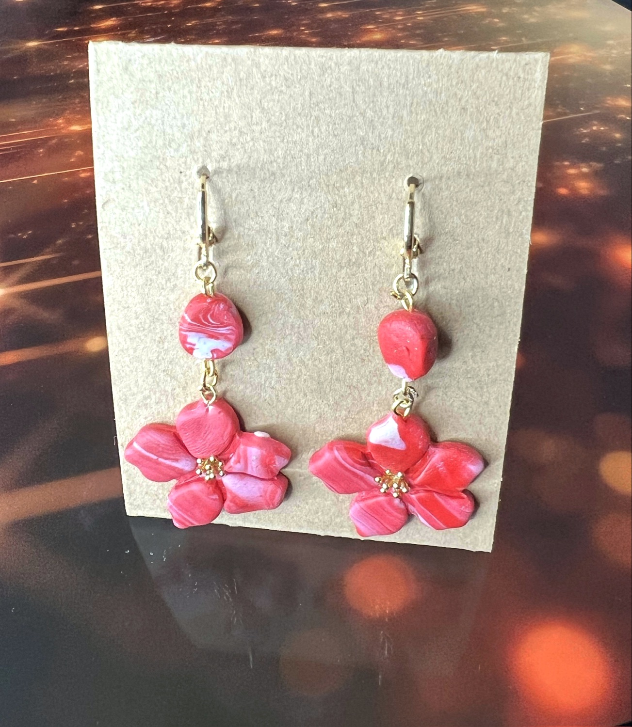 Blommor (örhängen guld) inkl spårbar frakt