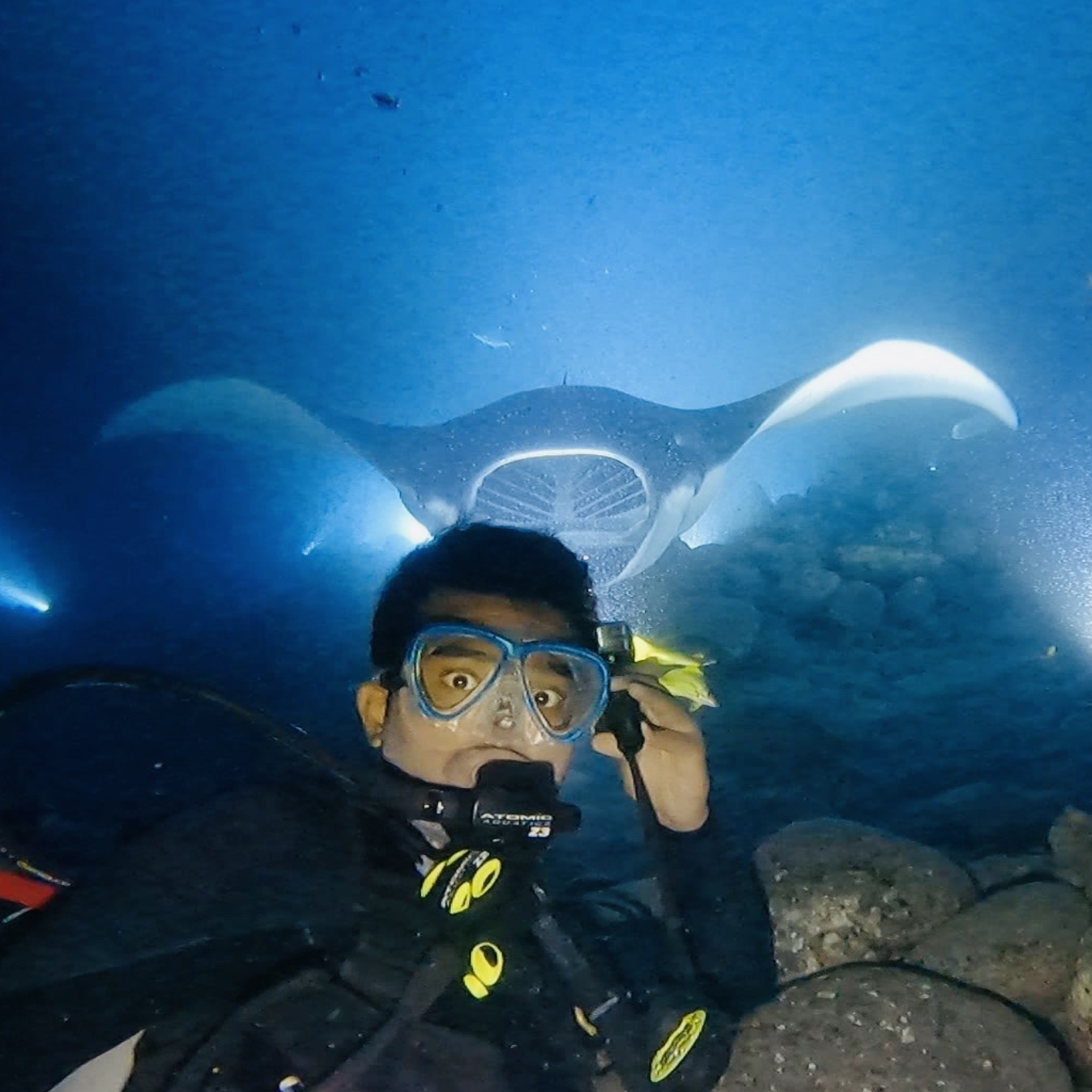 Pathik scuba diving with Manta Rays