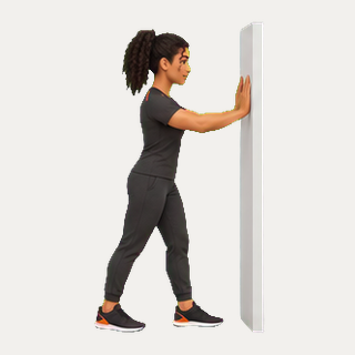 Bent-knee wall calf stretch · TrainAI