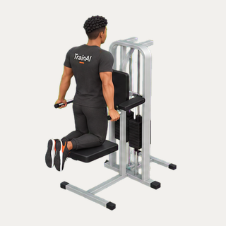 Kneeling machine-assisted triceps dip · TrainAI