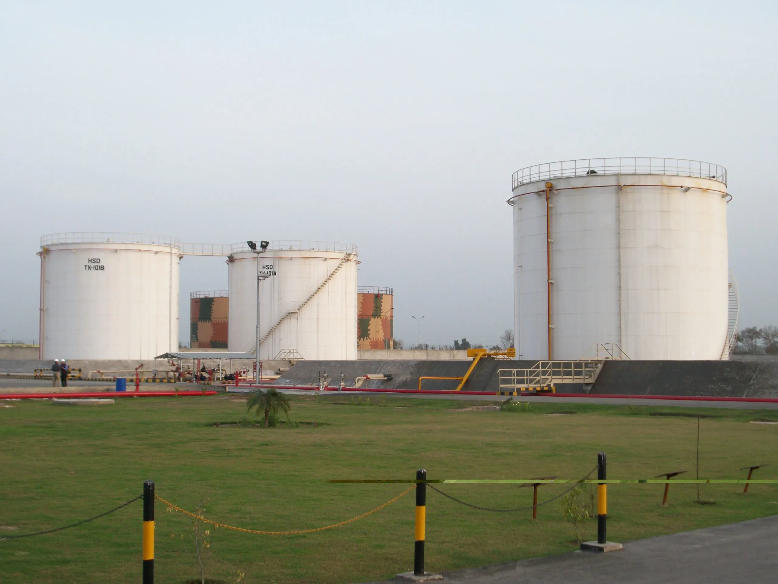 Above-ground HSD storage tanks TK-101A and TK-101B inside a bunded compound