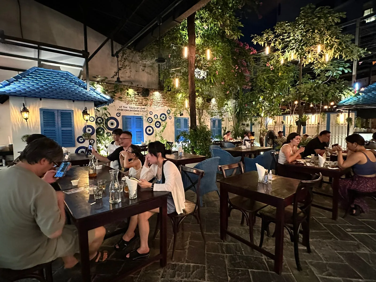 Elia Greek Kitchen, Street 308 — mezze and grilled souvlaki in a garden off the alley
