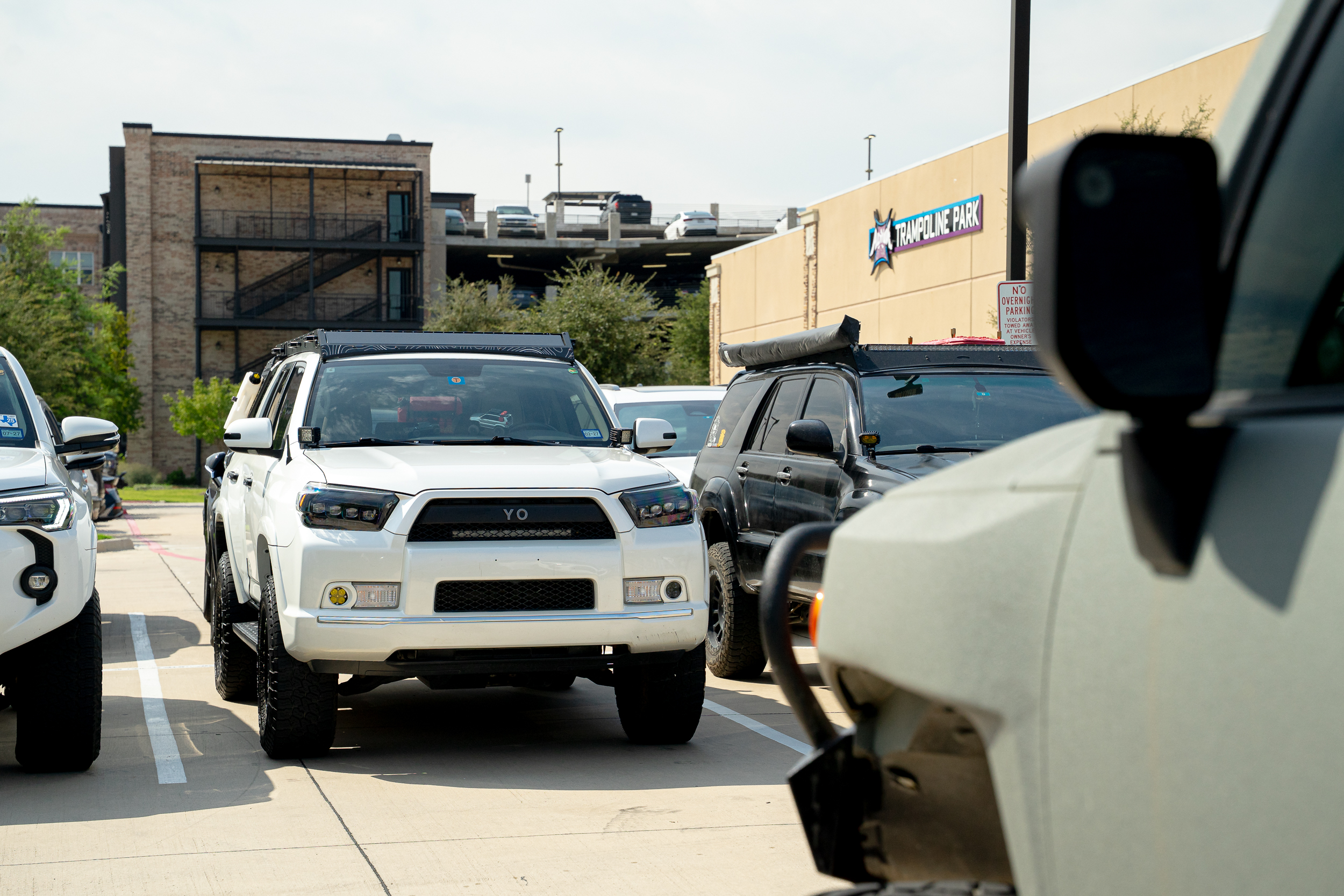 A 4Runner squeezed between the rows