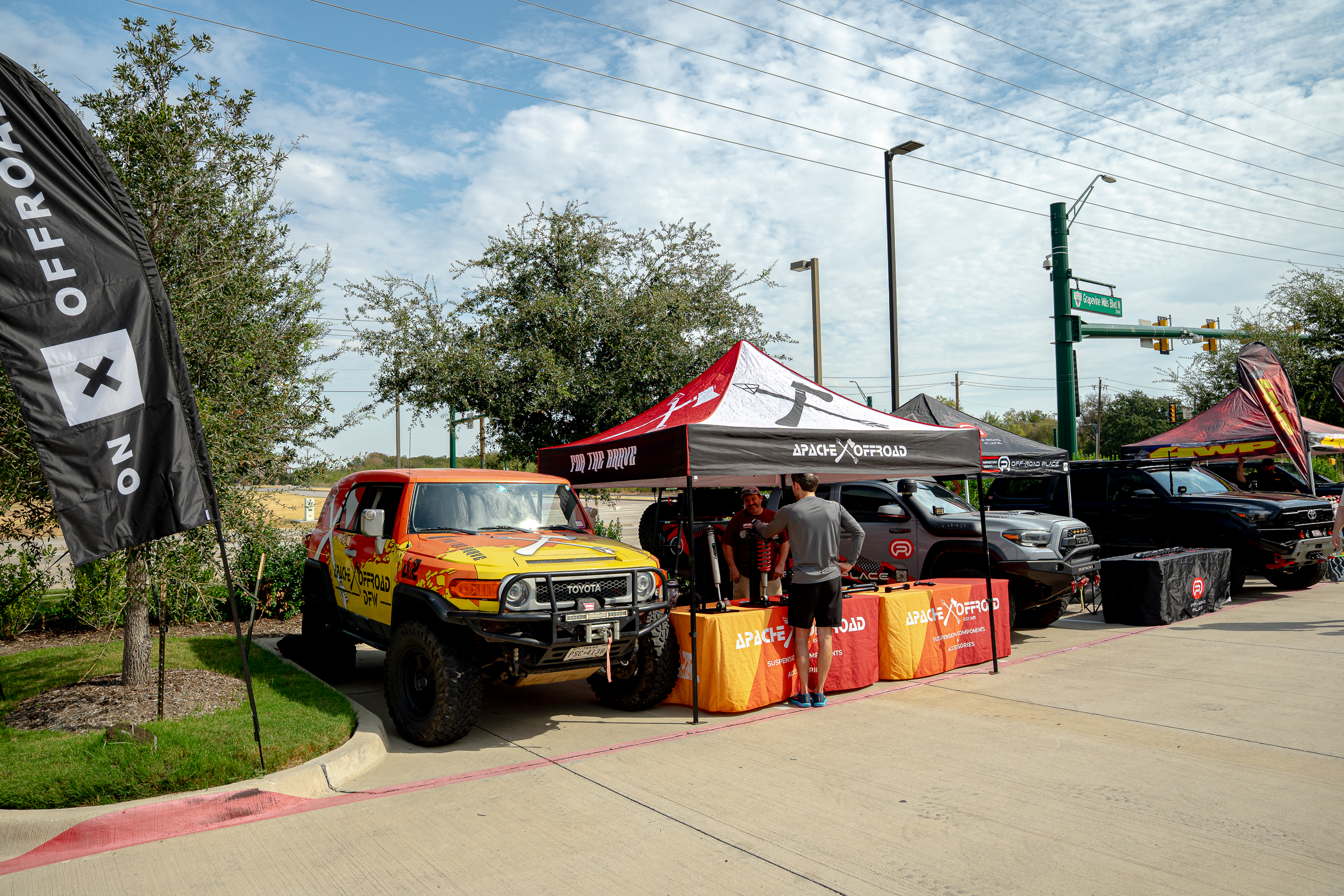 Apache Offroad, with a yellow FJ Cruiser out front