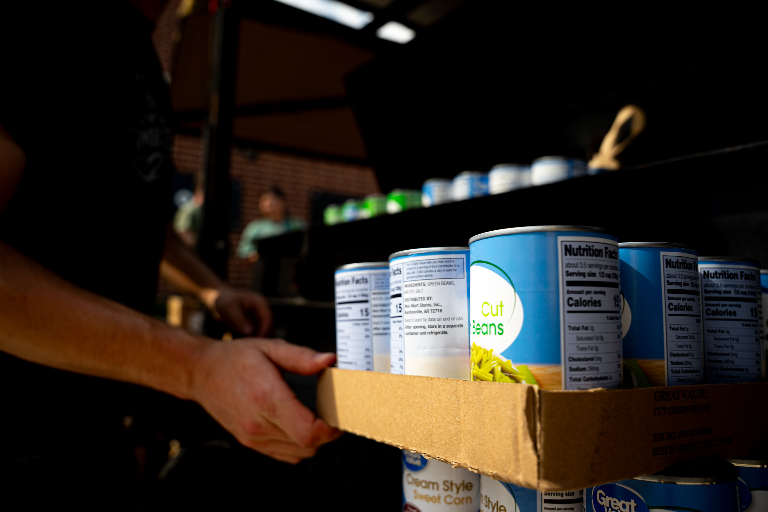 Cans coming in for the North Texas Food Bank
