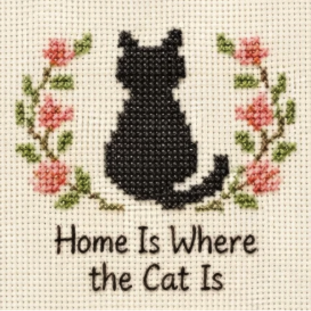 Cat silhouette rendered as a cross stitch pattern