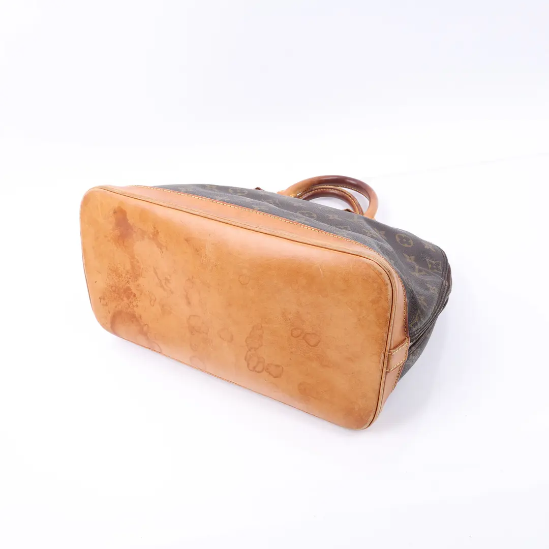Louis Vuitton Alma Brown Monogram Canvas Handbag