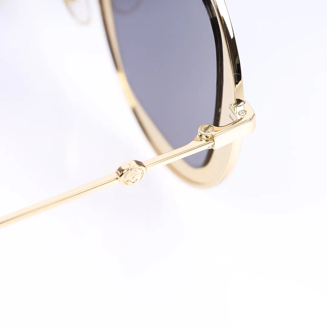Gucci GG0061S Black Gold Metal Round Sunglasses