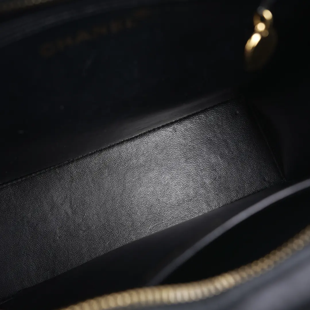 Chanel Vintage Embossed Logo Black Leather Shoulder Bag