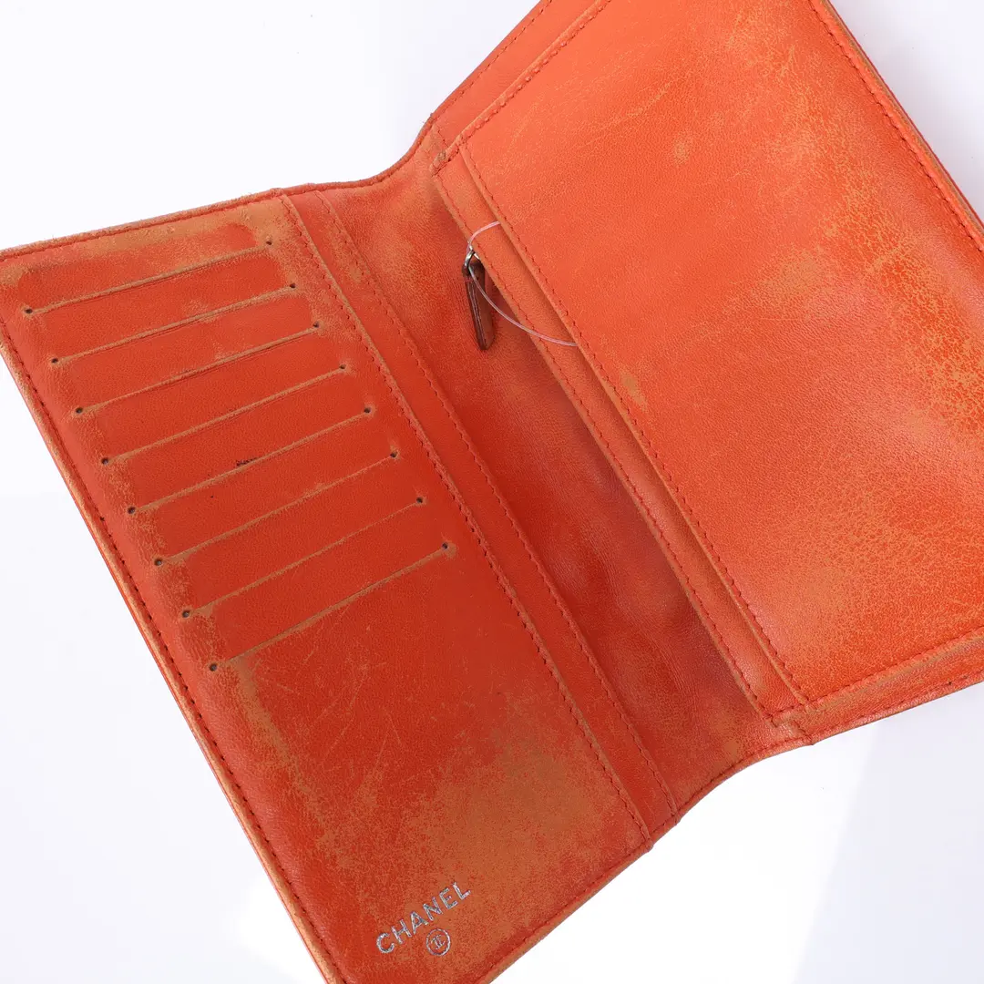 Chanel Icon Embossed Orange Patent Leather Wallet