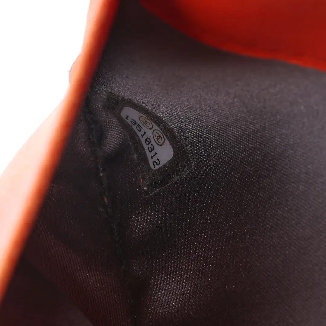 Chanel Icon Embossed Orange Patent Leather Wallet