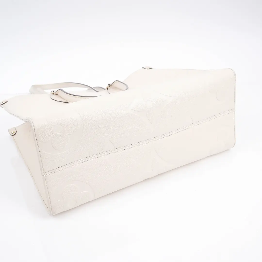 Louis Vuitton OnTheGo PM White Monogram Empreinte Tote Bag