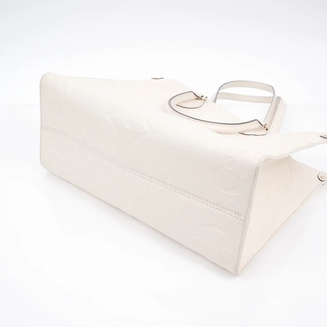 Louis Vuitton OnTheGo PM White Monogram Empreinte Tote Bag