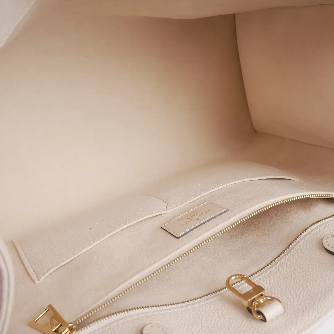 Louis Vuitton OnTheGo PM White Monogram Empreinte Tote Bag