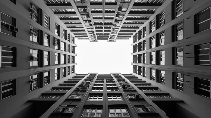 A multi condo building in a black and white minimalist style