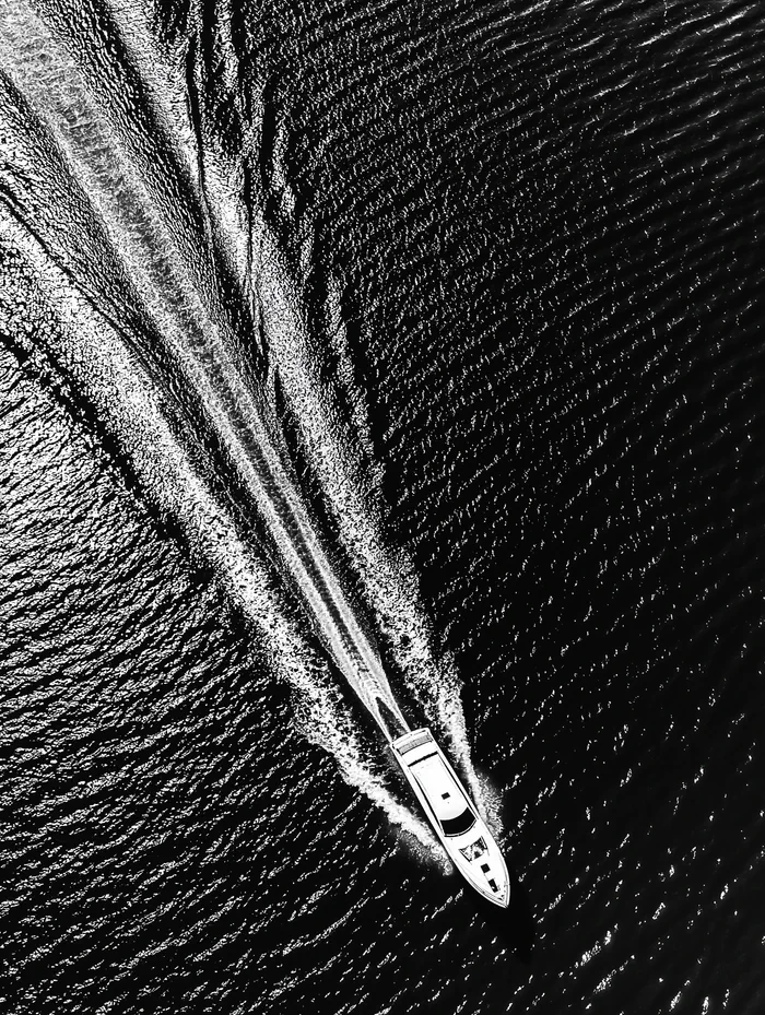 Boat on an ocean black-and-white