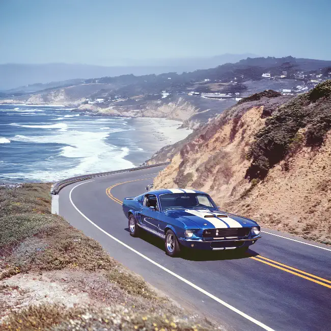 Blue Mustang on the Open Road