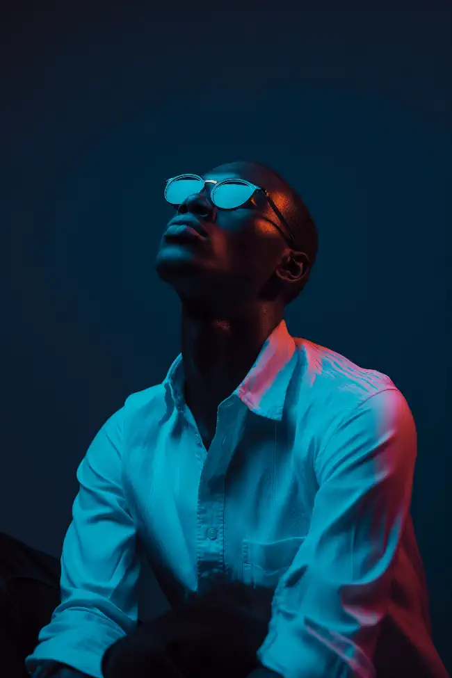 Dramatic portrait of someone wearing sunglasses