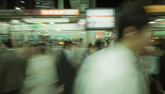 Fast-moving train and people 3