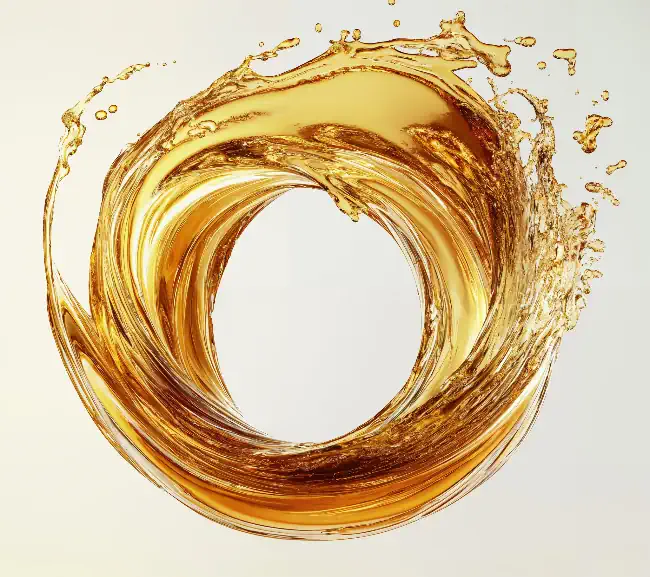 Circular splash of a golden liquid