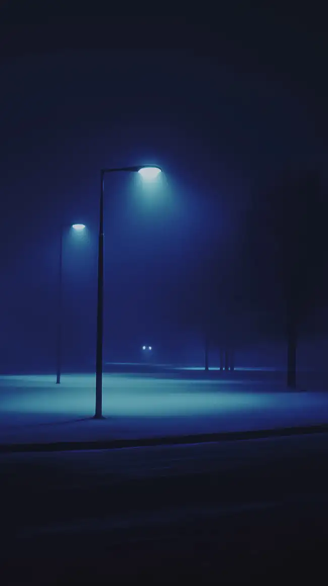 Nighttime scene bathed in blue light