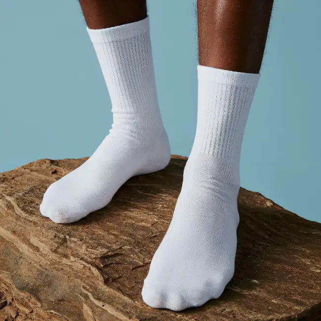 Close-up of a person wearing white socks