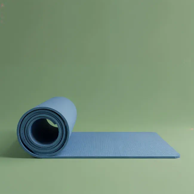 Blue yoga mat on a green background 3