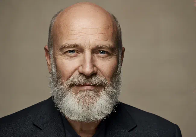 Direct Gaze of Bald Man
