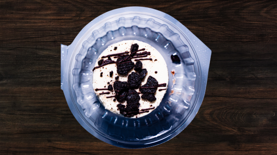 A slice of cookies and cream cheesecake