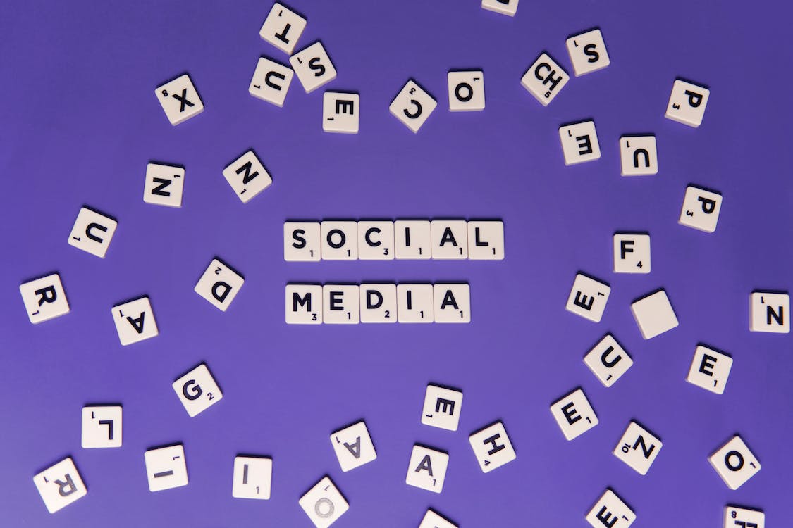 Letters form the word social media in English