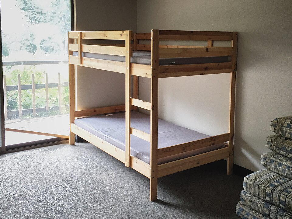 Wooden double bunk bed
