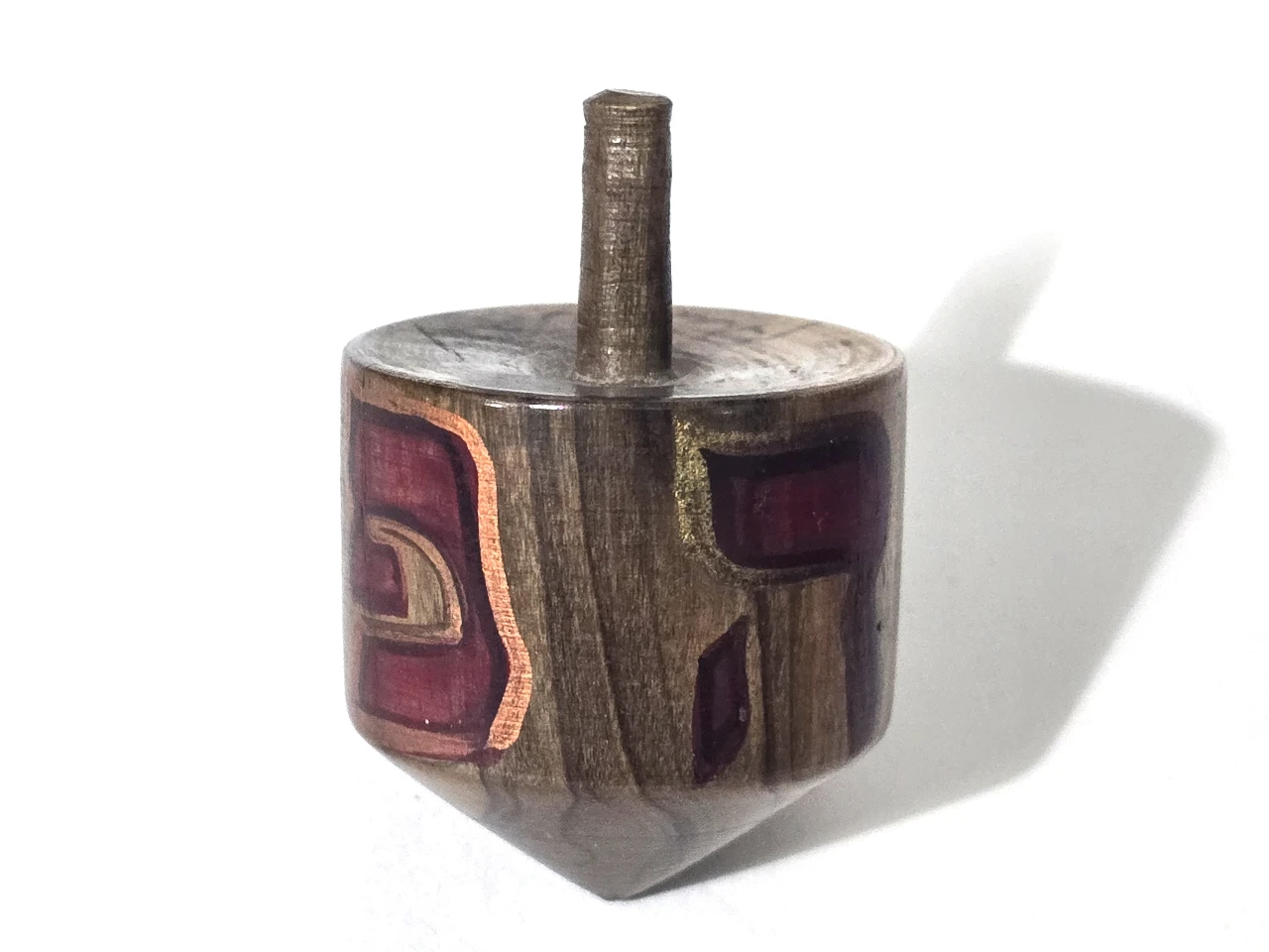 סביבון מעץ זית עבודת יד חתום חתימת אומן מידות: 	3 x 5 ס"מ