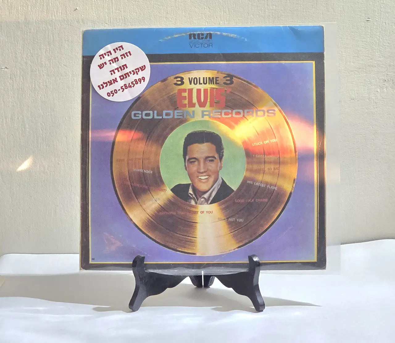 *נדיר-אלוויס פרסלי - Elvis - Voulume 3 of Elvis's Golden Records תקליט בעטיפה מקורית. סטריאו. תקליט במצב תקין, אריזה מוכתמת, עם קשקוש בצבע וחותמת 'שחם ישראל, ריינס 49 גבעתיים'.