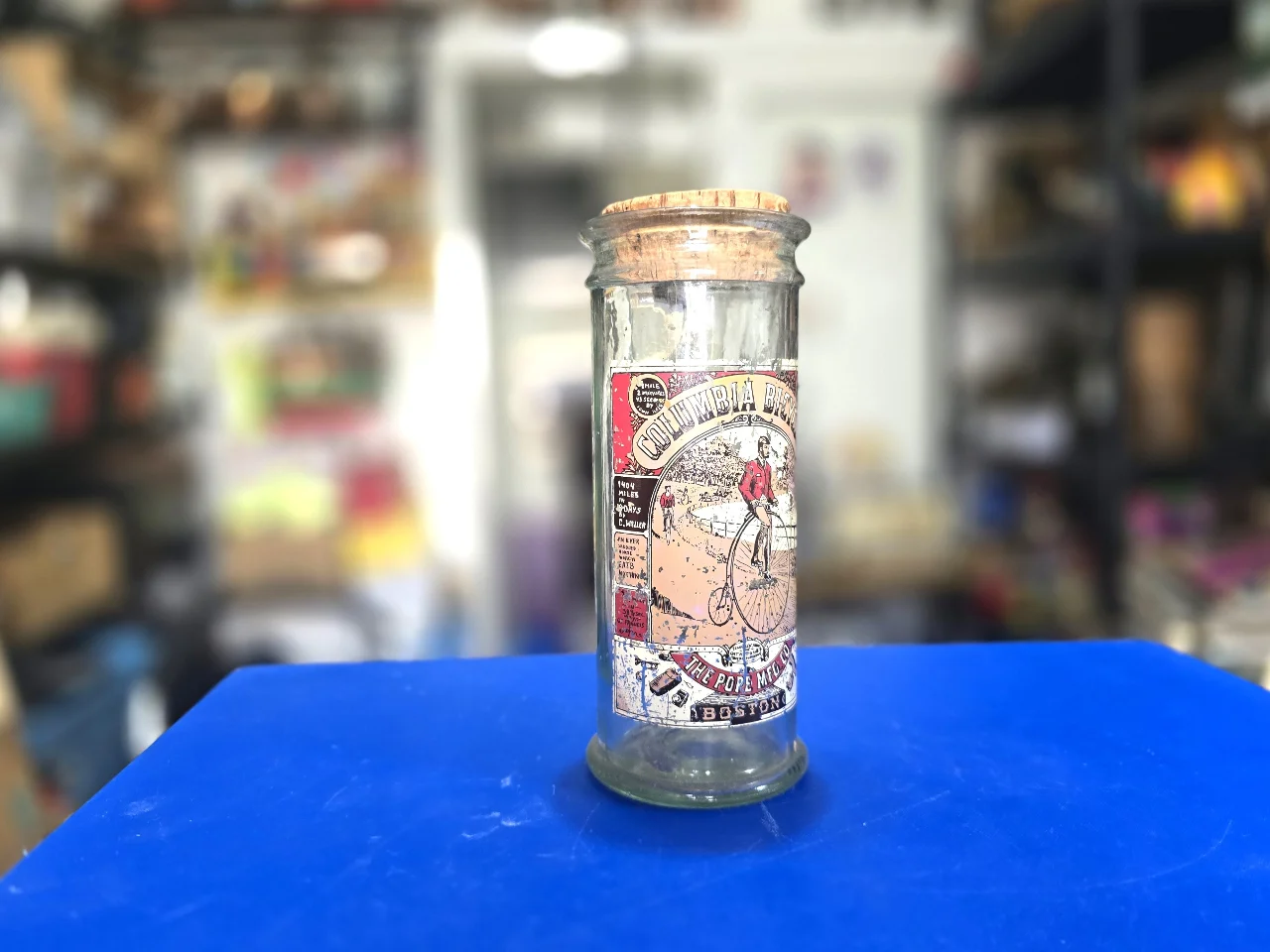 פריט דקורטיבי לאספנים או עיצוב מטבח צנצנת זכוכית גלילית וינט'ג פרסומת עבור אופני קולומביה אורך 23 ס'מ קוטר 10 ס'מ