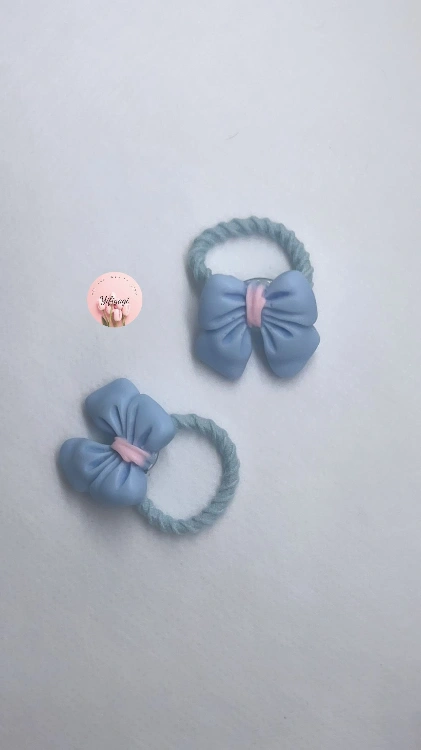 זוג גומיות פפיון תכלת