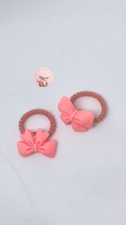 זוג גומיות פפיון ורוד